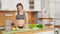 Pregnant Woman Preparing Fresh Green Salad On Kitchen. Healthy Pregnancy Concept