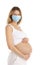 Pregnant woman in a protective mask