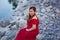 Pregnant woman in red dress