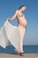 Pregnant woman at the sea