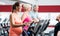 Pregnant woman and seniors training on cross trainer