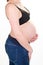Pregnant woman side profile belly in bra view in white background