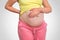 Pregnant woman with stomach ache - heartburn concept