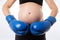 Pregnant woman strikes in boxing gloves