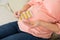 Pregnant Woman Taking Vitamin Pill At Home