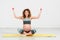 Pregnant woman with training with dumbbells