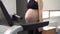 Pregnant Woman training treadmill machine in gym Cardio exercises on Running simulator
