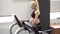 Pregnant Woman training treadmill machine in gym Cardio exercises on Running simulator