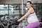 Pregnant woman using exercise bike