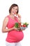 Pregnant woman with vegetarian food
