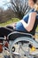 Pregnant woman in a wheelchair