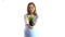 Pregnant woman on white background holds a pot of grass