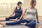 Pregnant woman in yoga class