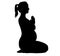 Pregnant women, mother to be trains fitnes sport aerobics, does yoga Pilates. Silhouette