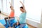 Pregnant women training with exercise balls in gym