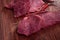 Premium cuts of raw steak. Fresh and raw meat. Raw meat mixture. Raw beef steaks on wooden table