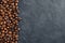 Premium roasted coffee beans on black background banner for coffee lovers and baristas