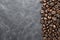 Premium roasted coffee beans on elegant black background ideal banner for coffee lovers and cafes