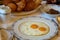 Premium sunny side up eggs with side potatoes, luxury breakfast unique cuisine in VIP gastronomy restaurant