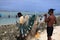 Prepairing the finishing net for fishing in Mauritius