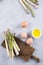 Preparation of asparagus and eggs. Simple products for a healthy breakfast. Space for text