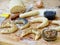 Preparation of bagels dough, greased egg and sprinkle with poppy seeds and flax seeds