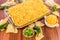 Preparation of bean dip with jalapenos, sour cream and cheddar c