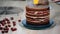 Preparation of chocolate cake with cherries. The cake is soaked with sweet syrup for moisture.