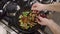 Preparation of chopped turkey meat with fresh broccoli and dried tomatoes