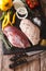 Preparation for cooking raw duck breast with vegetables and spic