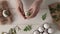 Preparation of Easter eggs for dyeing with onion peels - attaching a fresh leaf with a piece of old stockings, top view