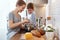 Preparation of family breakfast. mother and child daughter cook