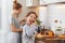 Preparation of family breakfast. mother and child daughter cook