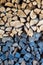 Preparation of firewood for the winter. Stacks of firewood. Pile of firewood