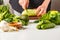 Preparation of green salad. Ingredients for salad on white table