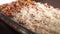 Preparation of homemade lasagna. Pouring grated cheese. Part of a set