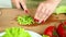 Preparation of homemade vegetable salad with cherry tomatoes, yellow pepper and quail eggs