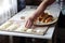 Preparation of house pies with onions and eggs