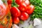 Preparation marinated conservation tomatoes with herbs, garlic, salt, and spice