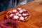 Preparation of a portion of pulpo a feira, traditional Galician octopus recipe. Spain