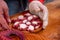 Preparation of a portion of pulpo a feira, traditional Galician octopus recipe. Spain