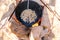 Preparation of raditional armenian pilaf in a cauldron on an open fire