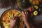 Preparation, Thanksgiving Day celebration. The chef finishes adding apples to the pie. Making a traditional apple pie. Nearby are