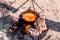 Preparation of traditional Armenian pilaf in a cauldron on an open fire