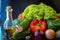 Preparations for a wonderful vegetarian dinner. Washed Bulgarian pepper, green cucumbers, onions, garlic, lettuce leaves and a