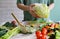 Prepare salad. Vegetables eating. Spring vitamins. Summer season. Healthy lifestyle. Vegan menu. Kitchen ingredients. Raw. Detox.