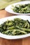 Prepared boiled dandelion greens bowl