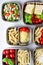 Prepared diet Lunches in lunch boxes: pasta, parmesan, lettuce, cherry tomatoes with basil.