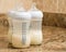 Prepared infant formula in bottles