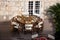 Prepared lunch or dinner table at a restaurant terrace in the old town of Dubrovnik in Croatia